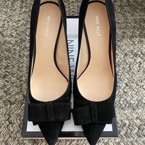 Black suede low heels with bows